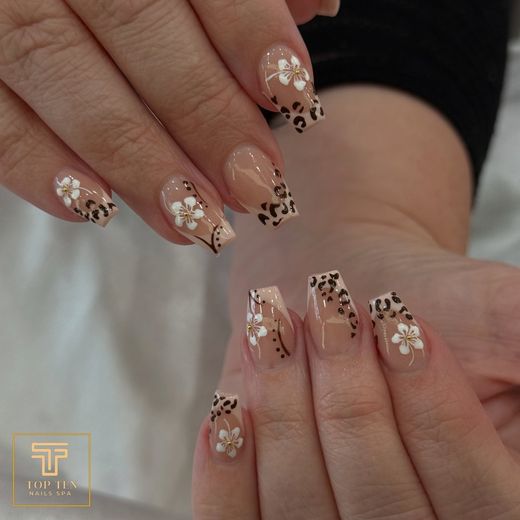 Nude almond nails with leopard and floral art, nails by Zoey at Top Ten Nails Spa